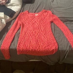 Sweater in various shades of pink